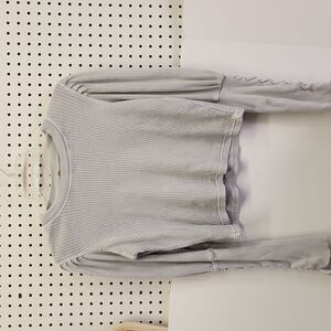 Free people waffle shirt women's size xs great condition.  Lace up long sleeves